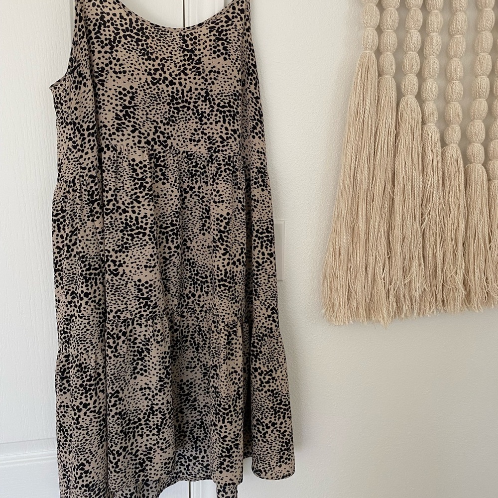 Black and beige print dress with key hole back and bow